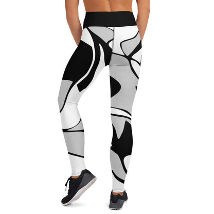 Back view of Yoga-Leggings N°38 showcasing black and white abstract design and high waistband, ideal for comfort and flexibility.