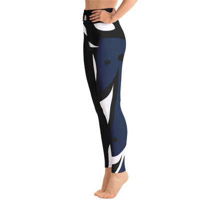 Woman wearing Yoga-Leggings N°12 with abstract black and white design, side view showcasing high waistband and four-way stretch fabric.