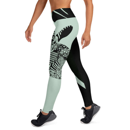 Model wearing Yoga-Leggings N°29 with a unique black and mint pattern, high-waist, four-way stretch for comfort.