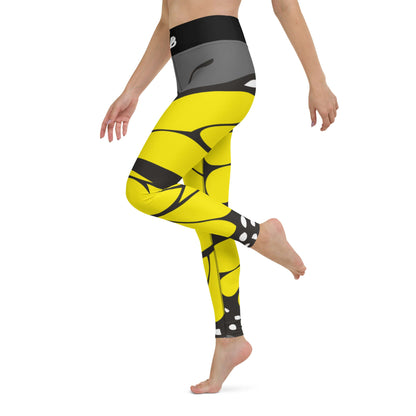 Yellow black Yoga-Leggings N°41 with four-way stretch and high waist, made from soft microfiber yarn, side view of model wearing them.