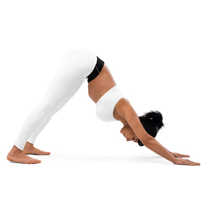 Woman performing yoga in white Yoga-Leggings N°44, demonstrating flexibility and comfort in downward dog pose on a white background.