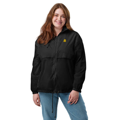 Woman wearing Basic-Unisex-Windbreaker N°0, black with front zipper and elastic cuffs, showcasing lightweight and durable design.