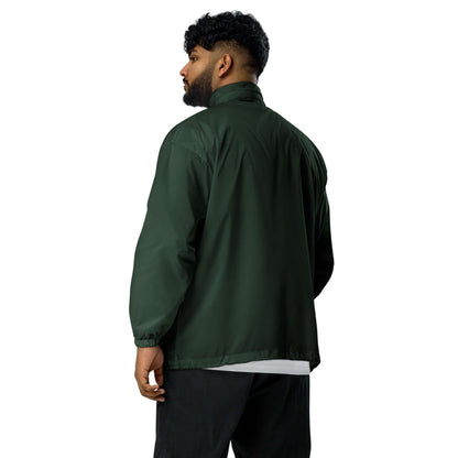 Back view of model wearing Basic-Unisex-Windbreaker N°0 in forest green, showcasing durable and water-repellent design.