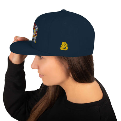 Woman wearing Snapback-Cap N°4, classic fit with flat visor, blue design, adjustable snap closure, embroidered details on side view.