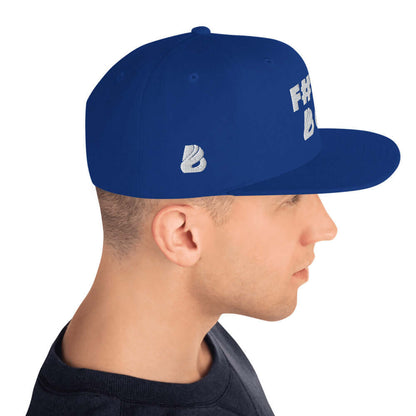Person wearing blue Snapback-Cap N°2 with structured 6-panel design and flat brim