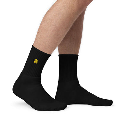 Schwarze Bestickte Socken N°0 mit gelbem Logo, in den USA hergestellt, aus Baumwolle, Polyester und Elastan, gepolsterte Sohle, maschinenwaschbar.