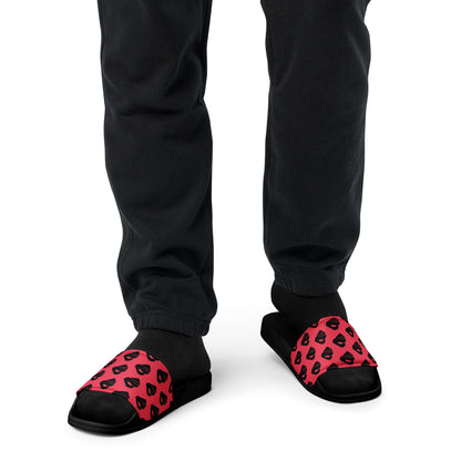 Man wearing Herren-Schlappen N°2 with red patterned strap for summer style and comfort.