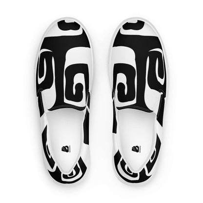 Herren-Canvas-Slipper N°0 with unique black and white design, featuring removable insoles and EVA rubber soles for comfort and style.
