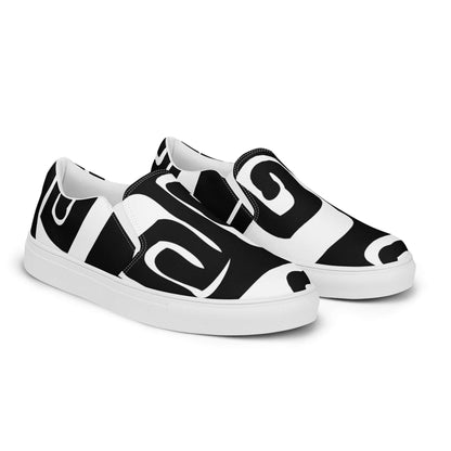 Stylish Herren-Canvas-Slipper N°0 with black and white design, featuring removable insoles and lightweight EVA rubber soles for comfort.