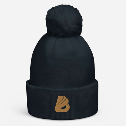 Bommel-Beanie N°0 in navy blue with a matching pom-pom, made from 100% soft acrylic fabric, ideal for cozy autumn and winter wear.