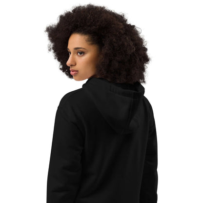 Person wearing Hochwertiger Öko Kapuzenpullover N°5, eco-friendly design, back view with hood, made from organic and recycled materials.