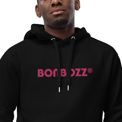 Model wearing Hochwertiger Öko Kapuzenpullover N°6 with BON BOZZ logo, made from organic cotton and recycled polyester in black color.
