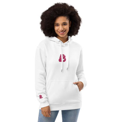 Woman wearing Hochwertiger Öko Kapuzenpullover N°8, a stylish white hoodie made from organic and recycled materials, with front pocket and hood.