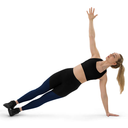 Woman performing side plank wearing Sport-Leggings N°2, ideal for moderate to intense workouts, black and navy design.
