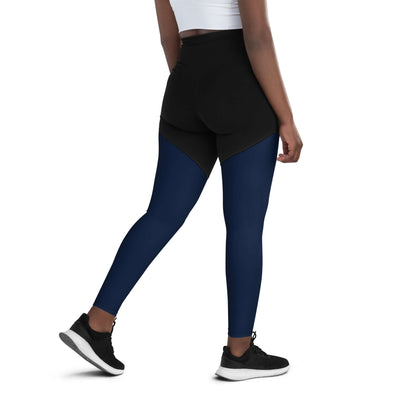 Person wearing Sport-Leggings N°1 in black and blue for active workouts