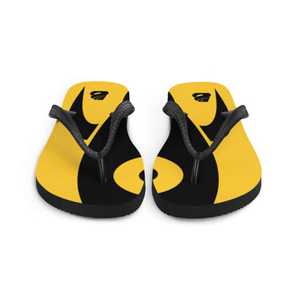Flip-Flops N°6 in yellow and black with soft fabric lining for summer comfort and style, featuring a rubber sole and black Y-shaped straps.