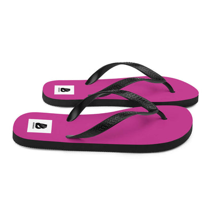 Vibrant pink flip-flops with black straps, perfect for summer adventures. Product name: Flip-Flops N°3.