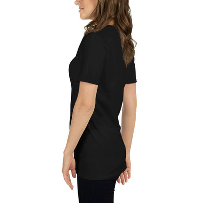 Kurzärmeliges Unisex-T-Shirt N°6, side view of black t-shirt on woman showing durable stitches and soft cotton fabric, popular basic clothing