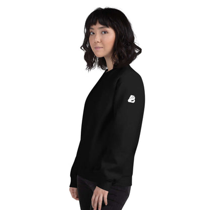Woman wearing Unisex-Pullover N°5 in black, classic fit, side view, comfortable and warm sweater for cold months