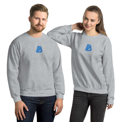 Two models wearing gray Unisex-Pullover N°26, featuring a soft, durable fabric, perfect for cold months. 50% cotton, 50% polyester blend.