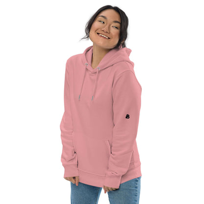 Umweltfreundlicher Unisex-Kapuzenpullover N°1 in pink, aus organischen und recycelten Materialien, getragen von einer Person