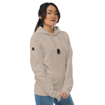Frau trägt Umweltfreundlicher Unisex-Kapuzenpullover N°0 aus Bio-Baumwolle mit Kapuze und Vordertasche in Beige