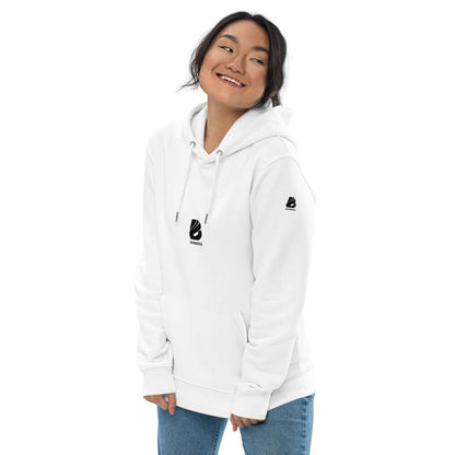 Frau trägt Umweltfreundlicher Unisex-Kapuzenpullover N°0, weiß, organische Materialien, reguläre Passform, umweltbewusstes Modeprodukt.