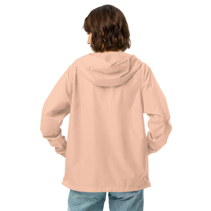 Person wearing Leichter Unisex-Windbreaker mit Reißverschluss N°0 from the back, showcasing the waterproof design in nude color.