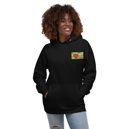 Smiling model wearing Unisex-Kapuzenpullover N°45 with colorful patch, kangaroo pocket, and cozy hood, styled for streetwear fashion.