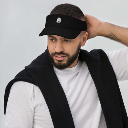 Man wearing Visor N°0, embroidered black sun visor with moisture-wicking fabric, protecting eyes from sweat and sun.